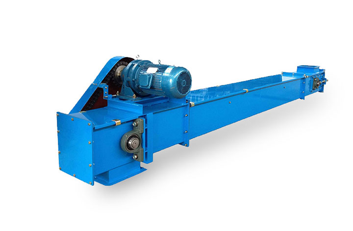 Explosion-proof motor and safety monitoring sensors installed on the head section of a grain bucket elevator.